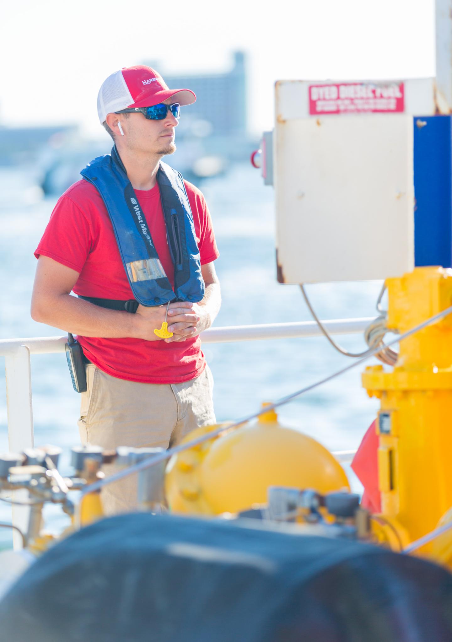 Harbor Fuels employee wearing PFD