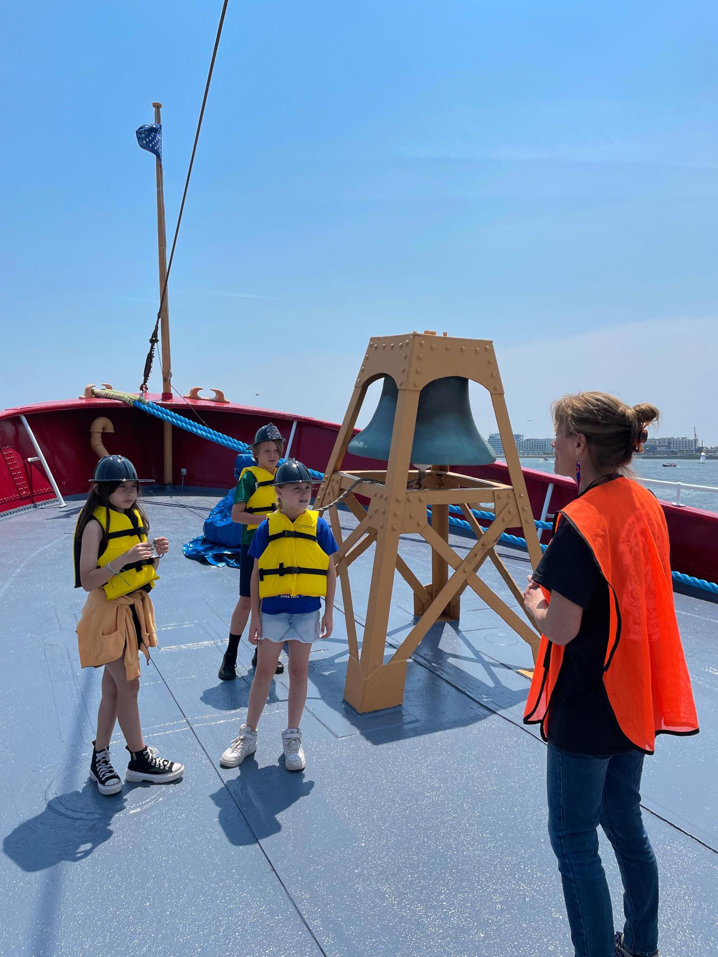 Kids learning about the history of the Nantucket Lightship on Kids in Boating Day